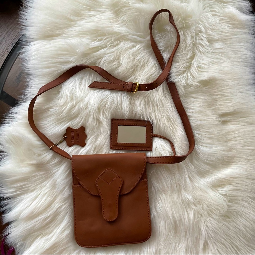 Wilsons Genuine Leather Small body/sh. Brown Bag